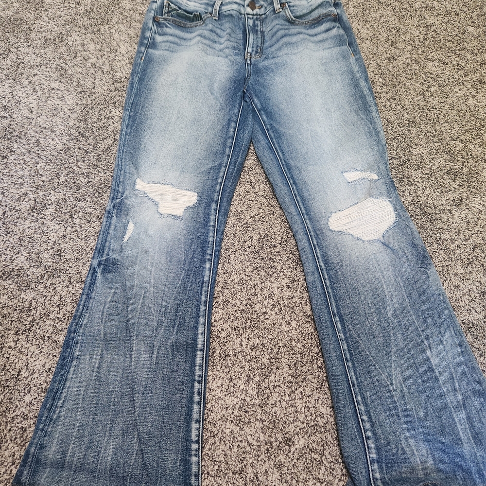 Women's Distressed Blue Jeans
